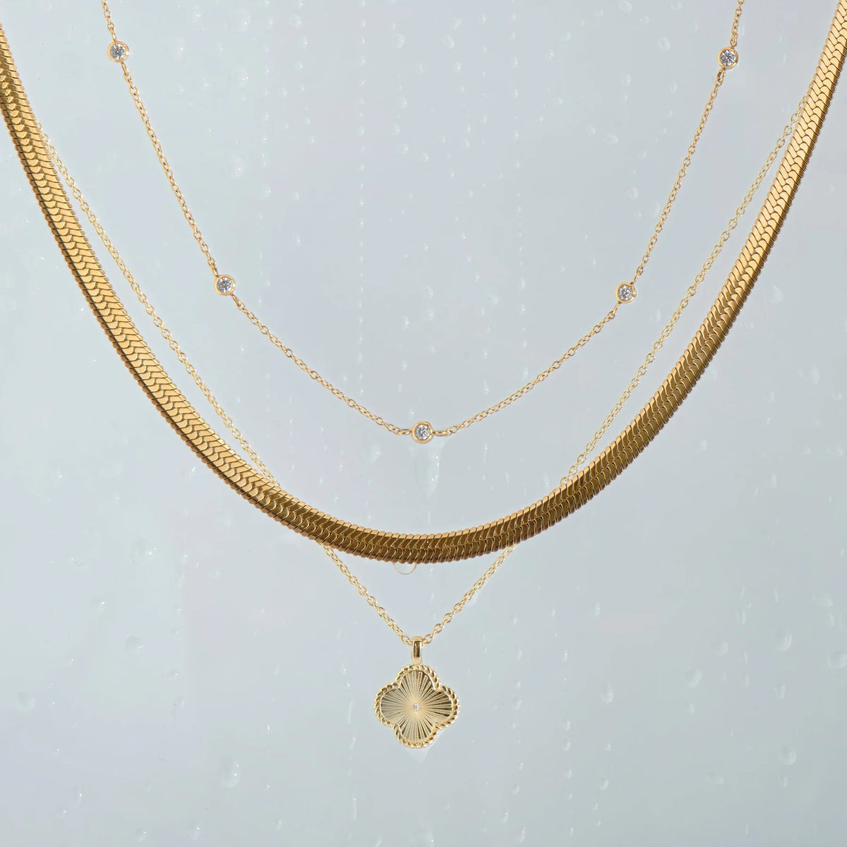 COLLIER ACIER INOXYDABLE DORE ET ZIRCONS JUPITER | MIA BIJOUX