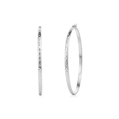 BOUCLES D’OREILLES XL MARTELÉES EN ACIER INOXYDABLE – AREZZO