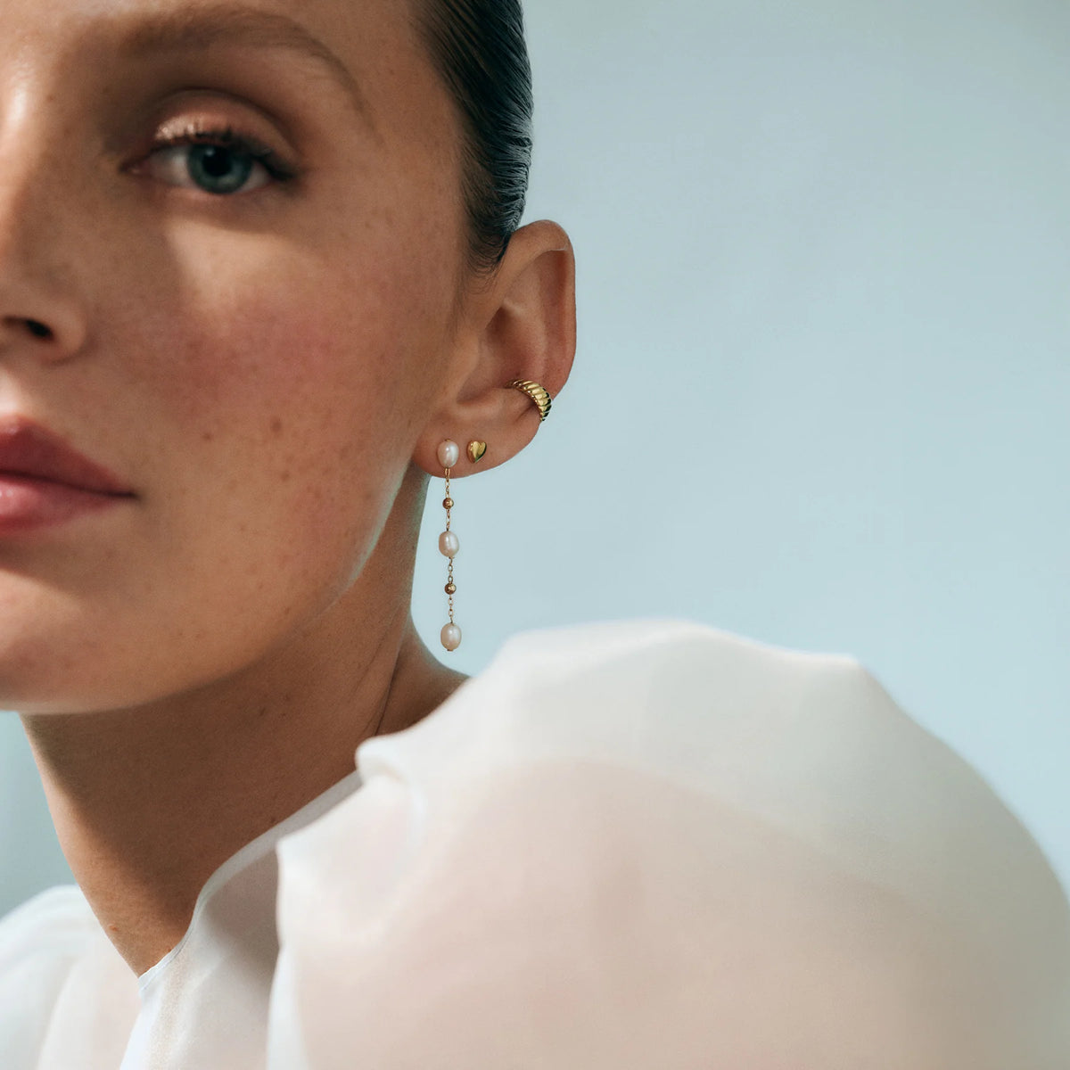 Ear Cuff torsadé Oria en acier inoxydable doré - Mia Bijoux